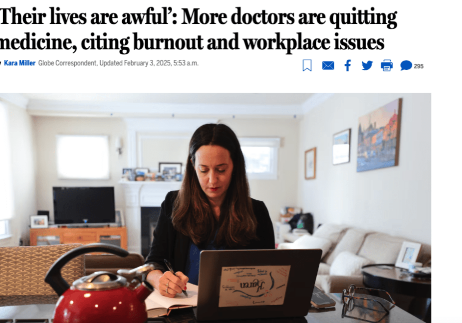 A news article headline reads, “‘Their lives are awful’: More doctors are quitting medicine, citing burnout and workplace issues.” The article is written by Kara Miller and was updated on February 3, 2025. Below the headline, there is an image of a woman with long brown hair, sitting at a table in a well-lit living room. She is wearing a black blazer over a dark-colored shirt and appears focused while writing in a notebook next to an open laptop. The laptop has a sticker with various medical-related words. A red teapot is visible on the table, along with a pair of reading glasses. The background includes a fireplace, a television, framed pictures on the wall, and a couch with cushions.